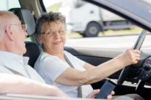 elderly woman driver smiling